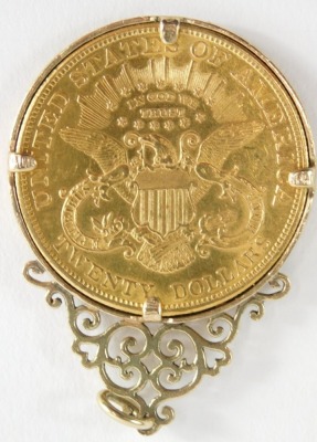 A 1904 double gold eagle United States of America twenty dollar coin, in an elaborate 9ct gold scroll mount, 6cm high, 39.2g all in. - 2