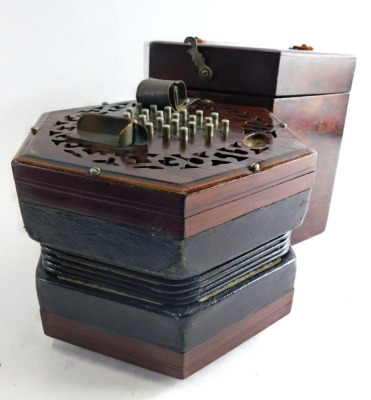 A 19thC Lachenal and Co London concertina, with 48 chrome buttons, in fitted case, 19cm high, labelled the case and body. - 2