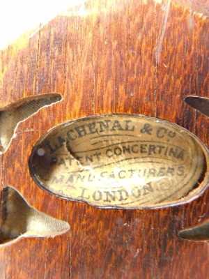 A 19thC Lachenal and Co London concertina, with 48 chrome buttons, in fitted case, 19cm high, labelled the case and body. - 4