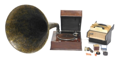 A 1920s EMG handmade gramophone number 319, with Grape Street, New Oxford Street, London label, of rectangular form, with articulated hinged lid revealing brown baize topped turntable, with chrome arm and large papier mache horn, the horn 125cm high, with