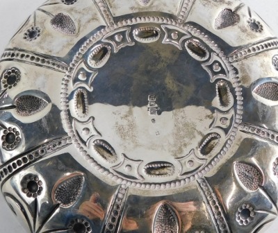 An Edward VII silver dish, by Wakeley and Wheeler, repousse decorated with panels of flowers, with a raised centre and elaborate handles, London 1903, 35cm wide, 20.4oz. - 5