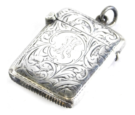 An Edward VII silver Vesta case, of oblong form, partially chased with ring top and match strike base, Birmingham 1902, 5cm high, 0.8oz.