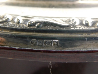 An Elizabeth II silver fronted mantel clock, marked R Carr Clock Makers, with 8cm wide paper dial printed with Roman numerals, with a raised outer floral band, marked England, Sheffield 1989, 17cm high. - 3