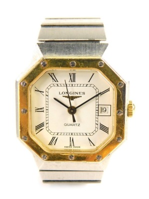 A Longines ladies wristwatch, with an octagonal watch head, on a white Roman numeric dial with date aperture, with gold coloured screw in bezel, on a stainless steel bracelet, the watch head 2cm x 2.5cm, the strap stamped stainless steel, 43g all in.