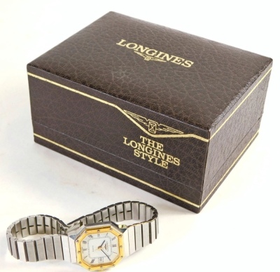 A Longines ladies wristwatch, with an octagonal watch head, on a white Roman numeric dial with date aperture, with gold coloured screw in bezel, on a stainless steel bracelet, the watch head 2cm x 2.5cm, the strap stamped stainless steel, 43g all in. - 2