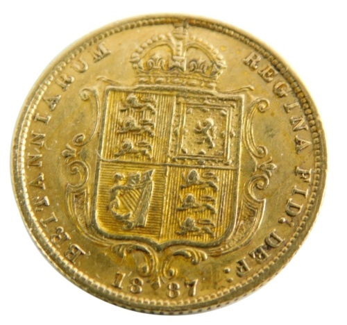 A Victorian gold half sovereign, shield back 1887.