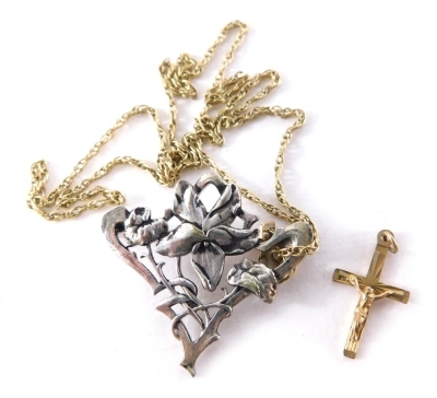 A group of jewellery, comprising of a white metal Art Nouveau style floral brooch 3.5cm wide, a 9ct gold neck chain and crucifix, 3.4g all in. (AF)