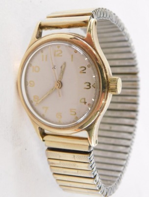 An RC 9ct gold cased gentleman's wristwatch, inscribed to the reverse R Cobb Viota Sales Competition 1955, on a silvered numeric dial, on expanding plated strap, the dial 2.5cm diameter, 56.3g all in. - 2