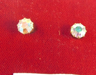 A pair of lustre stud earrings, each set with an imitation glittered stone, in a yellow metal basket setting, unmarked. - 2