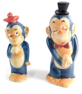 A Goebel Hummel figure of a monkey in top hat, 19cm high, marked beneath, and another with removable hat smaller.