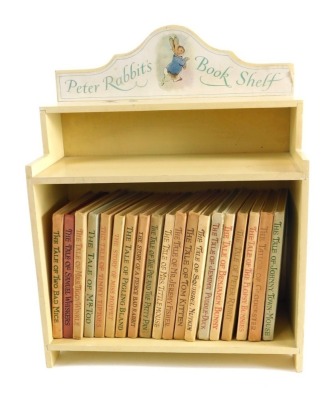 Potter (Beatrix). Various novels, the story of Miss Moppet etc in a Peter Rabbit bookshelf book case 30cm wide.