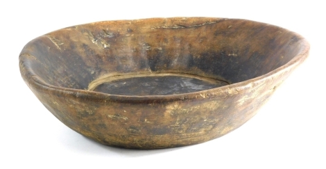 A rustic treen bowl, 42cm diameter.