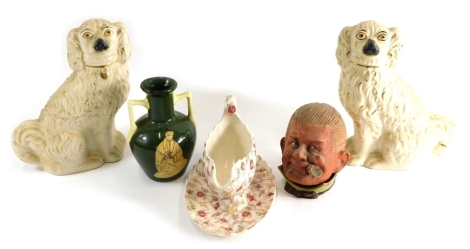 Various pottery and effects, two handled vase decorated with seated figure, gravy boat on stand, a pair of Staffordshire pottery dogs, and an unusual figure head jar, possibly a smoking stand. (a quantity)