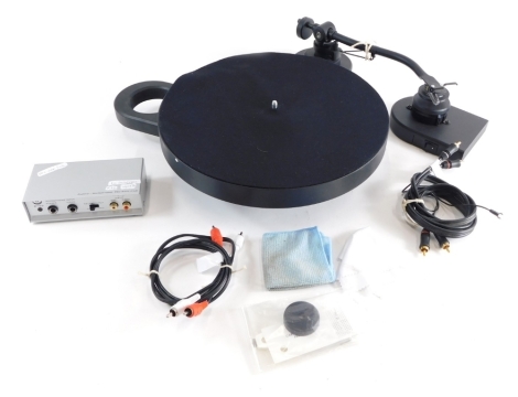 A Project turntable, number 003058rpm-1 genie 2, 41cms wide, with accessories. (a quantity)