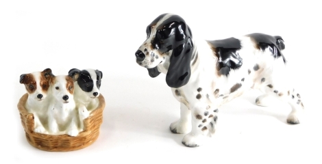 A Royal Doulton figure group Puppies In Basket, HN2588, and a further figure H1109, printed marks beneath, 14cms high. (2)