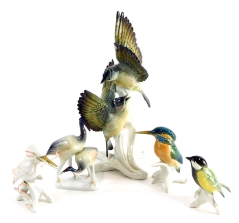 Various porcelain bird groups, A Karl Enns Kingfisher, two Enns birds on tree bough, Hollohaza Hungry figure groups Storks 16cms high etc (a quantity).