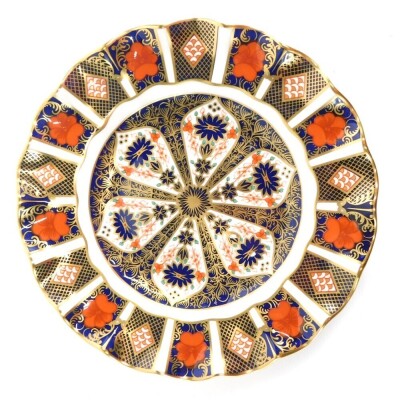 A Royal Crown Derby Old Imari pattern plate, with flared rim, marked beneath, 22cm wide.