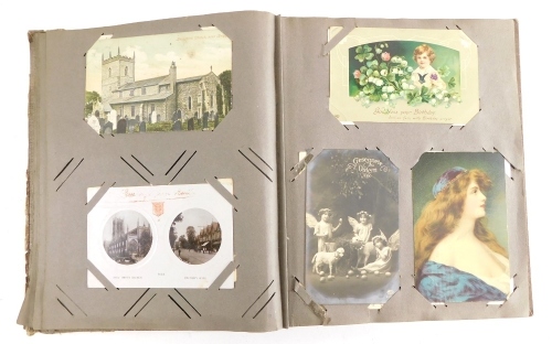 An album of various postcards, early 20thC scenery, A Moorland Shepherd, birthday greetings, Blackpool Promenade, various other Sweetheart cards, Many Happy Returns, Good Luck From Blackpool, etc. (1 album)