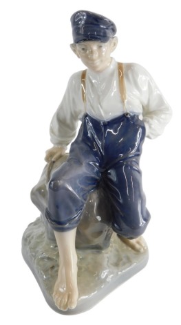 A Royal Copenhagen figure child sailor, number 1659, marked beneath, 35cm high.