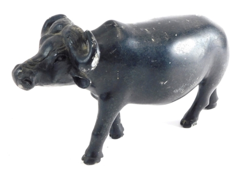 A carved stone figure of a buffalo, 18cm high.