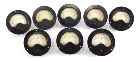 Various vault and amp dials, in Bakelite cases, one marked Rumbaken, 8cm diameter, etc., various others. (a quantity)