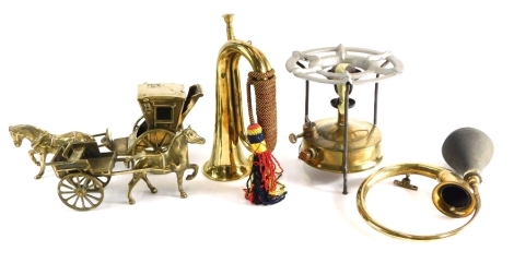 Various brassware, car horn with rubber end, brass bugle with material handle 28cm wide, horse and cart figure group etc (a quantity).