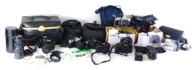 Various cameras and associated items, boxed Canon EOS 450D camera, quantity of other accessories, lenses, Fujica 1:4.5 lens, 16cm high, in outer case, a Tamrac case, various other camera equipment, cases, other box cameras, Minolta, JVC, cables, straps, l