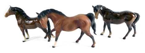 Various Beswick horses, matt finish brown horse with right leg raised, 17cm high, another black circle mark beneath, and a further Beswick horse. (3)