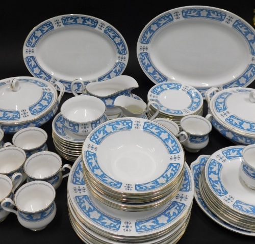 A comprehensive Royal Albert Tudor Rose pattern part dinner service, to include a pair of lidded tureens, 28cm wide, bowls, dinner plates, side plates, graduated pair of meat plates, cups, milk jugs, sugar bowl, etc., printed marks beneath, part settings