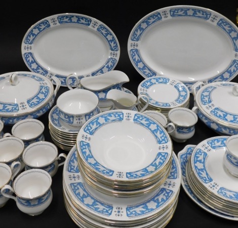 A comprehensive Royal Albert Tudor Rose pattern part dinner service, to include a pair of lidded tureens, 28cm wide, bowls, dinner plates, side plates, graduated pair of meat plates, cups, milk jugs, sugar bowl, etc., printed marks beneath, part settings 