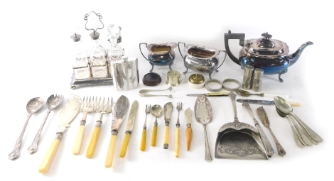 Various silver plated ware, an early 20thC three piece tea service, fish servers with faux handles, various other flatware, and a cut glass cruet stand, with silver plated stand. (a quantity)