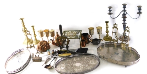 A silver plated three branch candelabrum, 49cm high, brass candlestick, trivet, various copperware, reproduction jelly mould, various goblets, knife rests, etc. (a quantity)