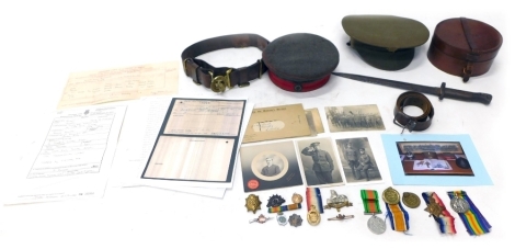 A British Colonial photo Co photograph of an Army regiment, marked 34-36 Castle Street Salisbury, and a quantity of related peak caps, Army related with cap badges, WWI medals etc, Harold Bemrose, Saxilby related, brown leather collar box etc (a quantity