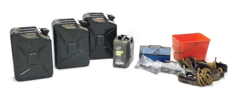 Three metal oil cans in green 50cms high, a smaller jerry can, tool box etc (a quantity).