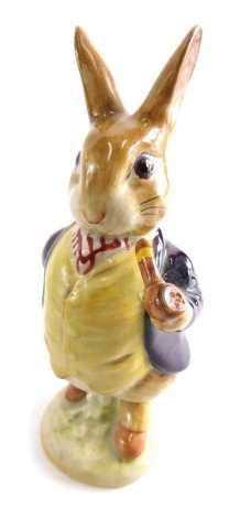 A Beswick pottery Beatrix Potter figure Mr Benjamin Bunny, gold oval mark beneath, 11cm high.