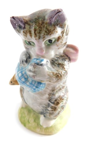 A Beswick pottery Beatrix Potter figure Miss Moppet, gold oval mark beneath, 7cm high.