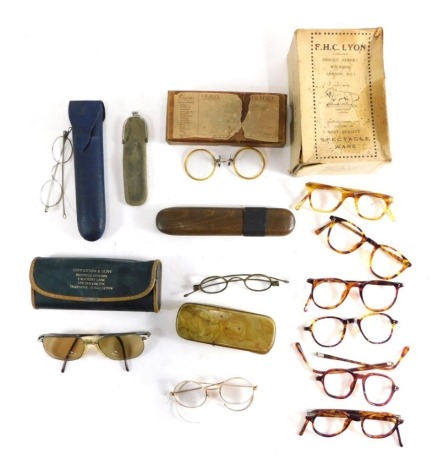 Various optical items and spectacles, spectacle cases, FHC Lyon box, 16cm wide, various other spectacle cases, gilt rimmed spectacles with curved side bars, etc. (a quantity)