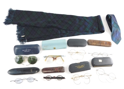 Various optical items spectacles and cases, a gilt framed pince nez in pressed case, 14cm long, various other spectacles, etc. (a quantity)