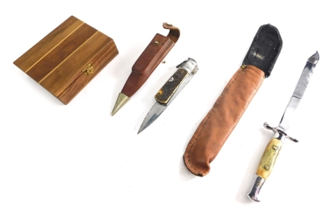 A bone handled folding knife, further horn handled knife with fixed blade 31cm wide with a sheaf and a vacant box (a quantity).