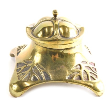 An Art Nouveau style crown topped brass inkwell, unmarked, 9cm wide.