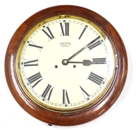 A 20thC walnut cased school clock, the 28cm diameter Roman numeric dial marked Smiths Enfield, in plain case.