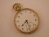 A 9ct gold pocket watch with a white enamel dial subsidiary seconds