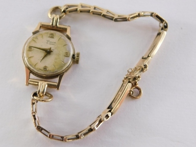 A 9ct gold Timor ladies wristwatch, with V splayed bracelet and safety chain, lacking glass covering, 12.8g all in. - 2