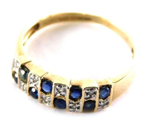 A 9ct gold sapphire and diamond dress ring, of modern box design, set with eight sapphires and eight diamonds, yellow band stamped 9ct, ring size O, 9g all in.