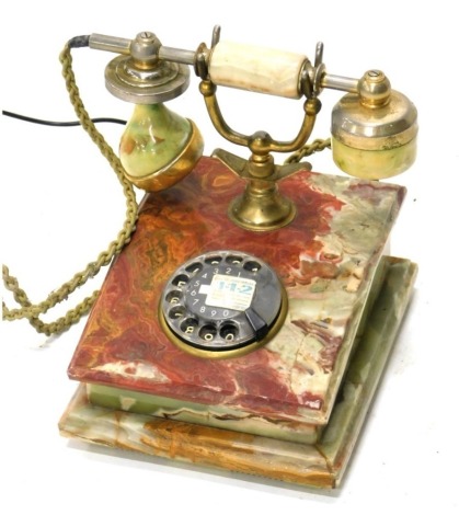 An onyx telephone, with modern fitting, 24cm high.