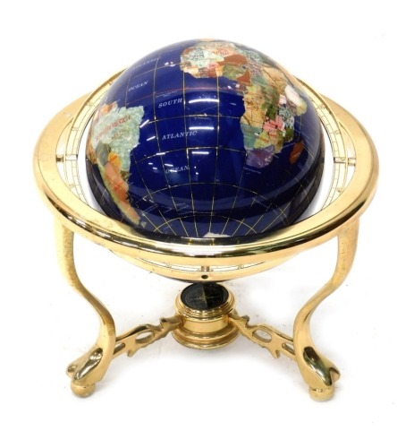 A lapis style miniature table globe, on articulated axis, 39cm high.