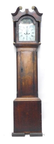 A 19thC oak and mahogany longcase clock, the painted 28cm wide Roman numeric and Arabic arched dial decorated with exotic birds and animals, with subsidiary second hand and date aperture, in a broken swan neck pedimented case, above a shaped trunk door i