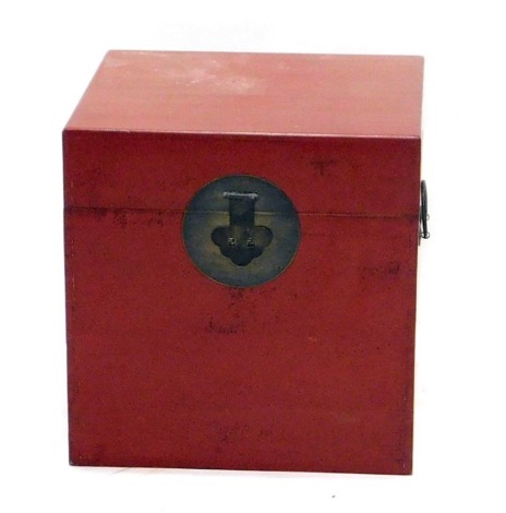 A modern red oriental square box, with heavy lock and plain interior, 47cm high, 47cm wide, 47cm deep.