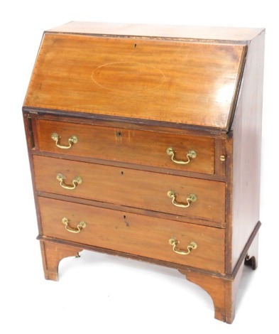 An Edwardian mahogany and boxwood strung bureau, the fall revealing a fitted interior, above three long drawers, 107cm high, 76cm wide, 50cm deep.