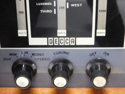 A Decca walnut cased radiogram, with Garrard turntable, 31cm wide, and Decca system, on turned legs, the cabinet 73cm high, 108cm wide, 38cm deep. - 2